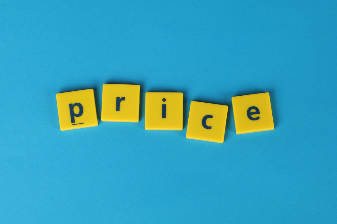 price in yellow letters on a blue surface 