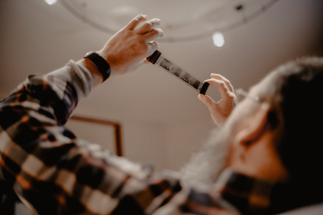 A Person Holding a Film Strip