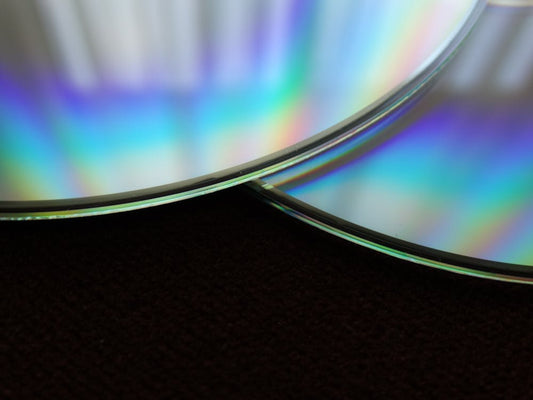 Discs on a black surface