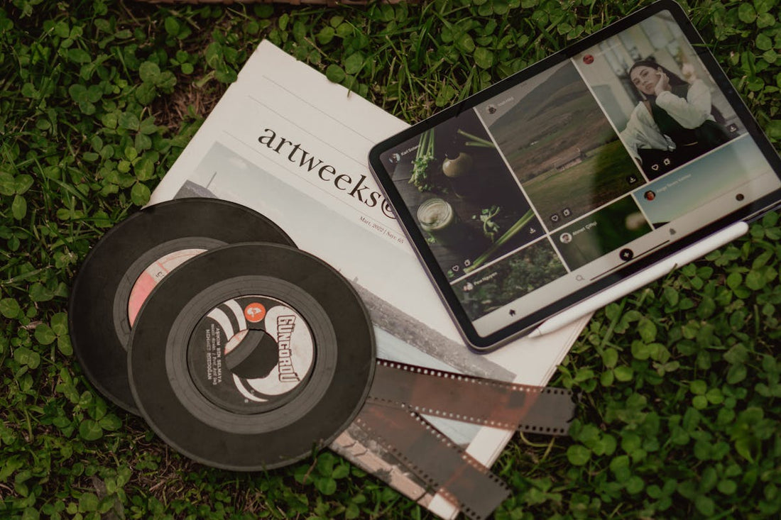 Pictures on Tablet on Ground with Disks and Photographic Films