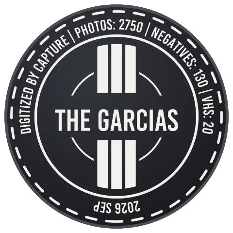 Black Vault lid laser-engraved in the Dynamic style with the name The Garcias in bold capitals between stripes and a dashed border