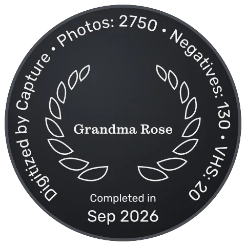 Black Vault lid laser-engraved in the Laurel style with the name Grandma Rose inside a laurel wreath and a Digitized by Capture border